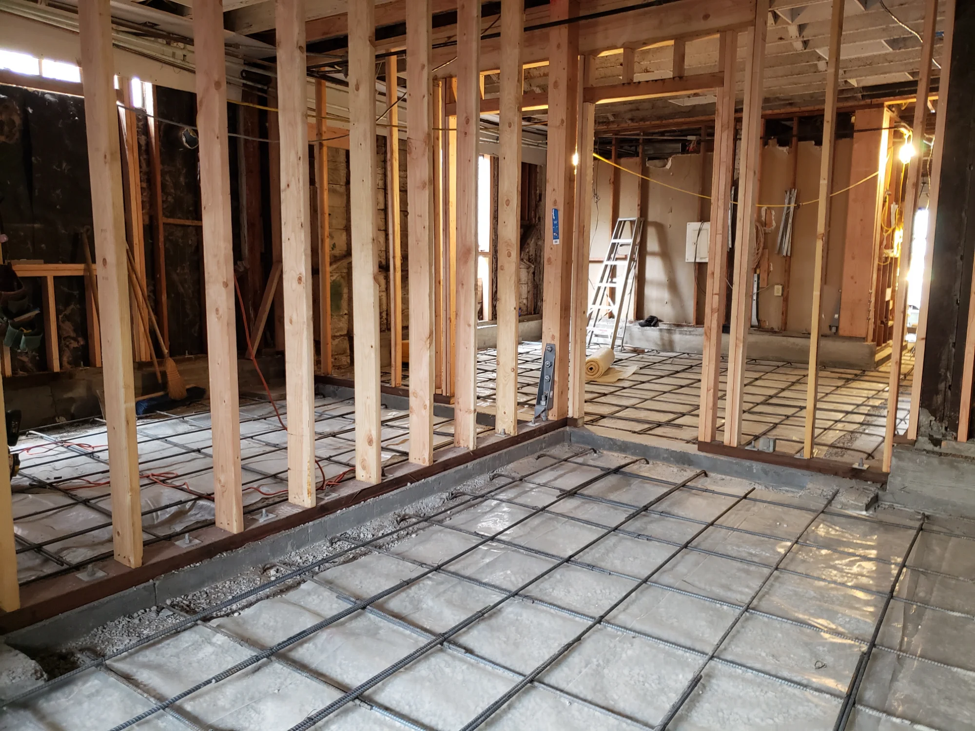Rebar grid tied over a prepared ground before the concrete pour
